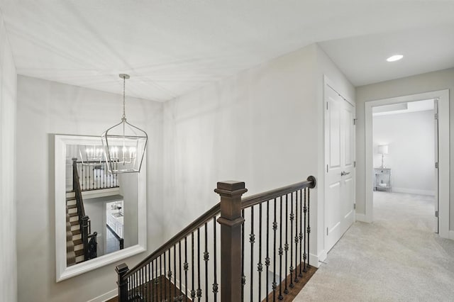 16005 Melrose St, Overland Park, KS 66221 - corridor featuring an upstairs landing, a chandelier, carpet floors, and recessed lighting