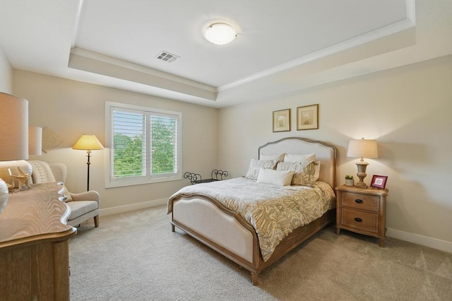 16005 Melrose St, Overland Park, KS 66221 - carpeted bedroom featuring a tray ceiling and ornamental molding