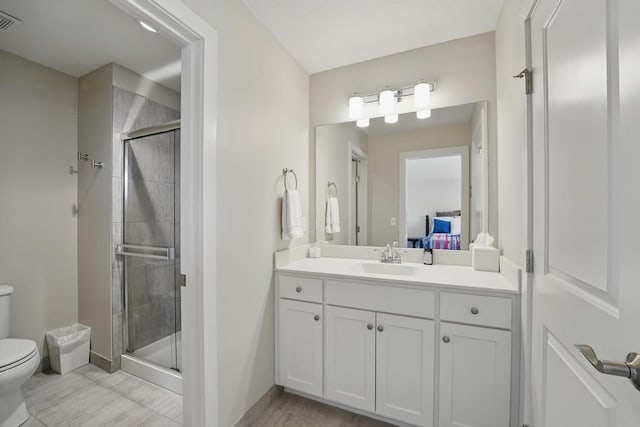 16005 Melrose St, Overland Park, KS 66221 - bathroom featuring vanity, a stall shower, and connected bathroom