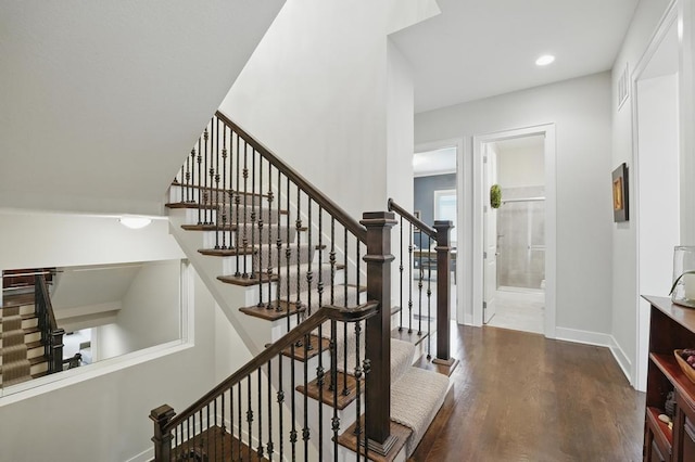 16005 Melrose St, Overland Park, KS 66221 - stairway featuring wood finished floors and recessed lighting