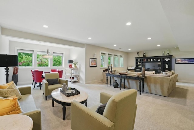 16005 Melrose St, Overland Park, KS 66221 - living room featuring light colored carpet, recessed lighting, and healthy amount of natural light