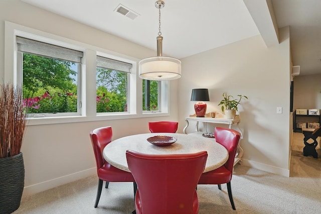 16005 Melrose St, Overland Park, KS 66221 - carpeted dining area featuring baseboards