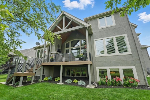 16005 Melrose St, Overland Park, KS 66221 - rear view of property with stucco siding, stairway, a yard, and a deck