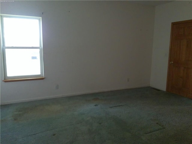 503 W Shawnee St, Paola, KS 66071 - carpeted spare room with healthy amount of natural light