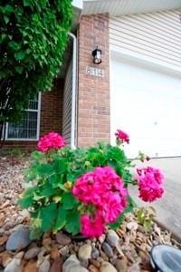 814 Clancy Ct, Raymore, MO 64083 - exterior view of brick siding