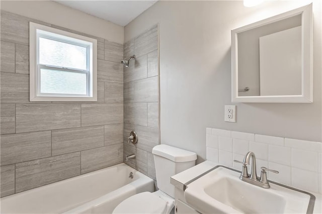 6401 E 120th Ter, Grandview, MO 64030 - bathroom featuring toilet, shower / washtub combination, and a sink