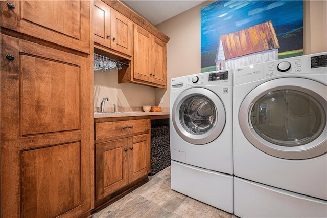 11408 NE 113th Ter, Liberty, MO 64068 - laundry room with cabinet space and washing machine and clothes dryer