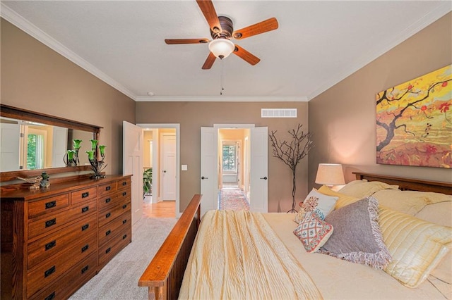 11408 NE 113th Ter, Liberty, MO 64068 - bedroom with crown molding, carpet, and a ceiling fan