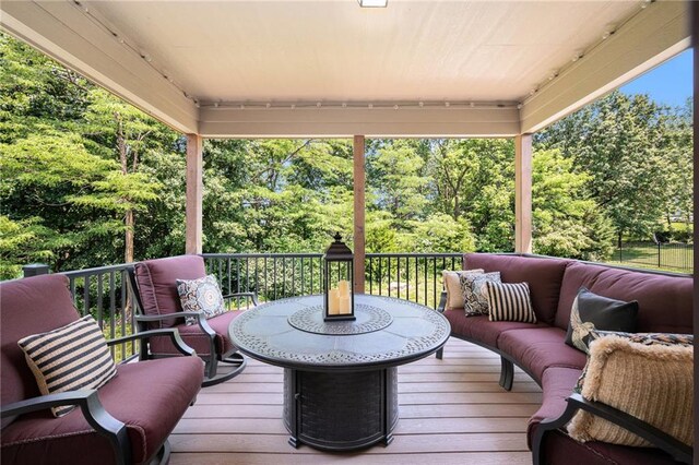 11408 NE 113th Ter, Liberty, MO 64068 - wooden deck featuring view of wooded area