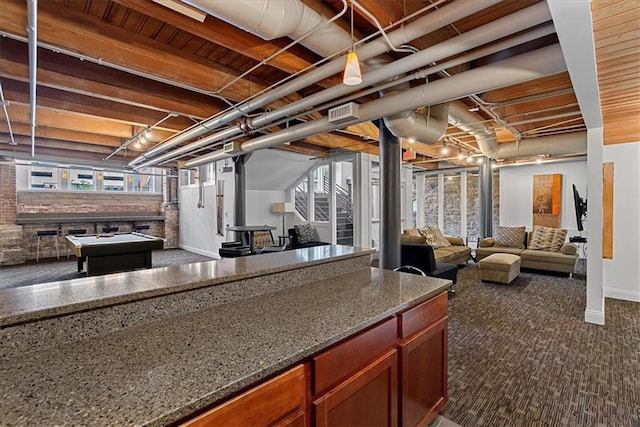 700 Broadway Blvd Unit 507, Kansas City, MO 64105 - below grade area featuring dark colored carpet and healthy amount of natural light