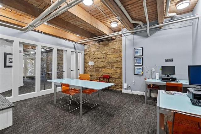700 Broadway Blvd Unit 507, Kansas City, MO 64105 - office area with carpet flooring and a wood ceiling with exposed beams