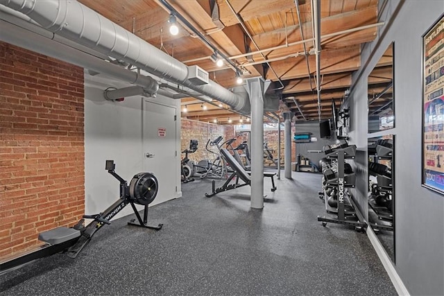 700 Broadway Blvd Unit 507, Kansas City, MO 64105 - exercise area featuring brick wall