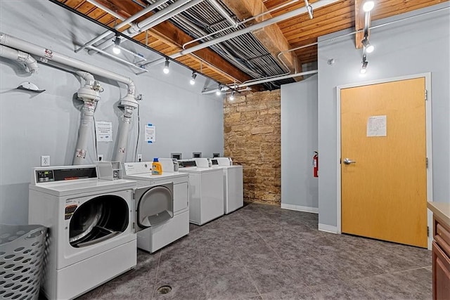 700 Broadway Blvd Unit 507, Kansas City, MO 64105 - shared laundry room featuring washing machine and clothes dryer