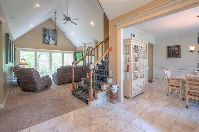 309 E 126th St, Kansas City, MO 64145 - living area with ceiling fan, stairway, light marble finish flooring, high vaulted ceiling, and recessed lighting