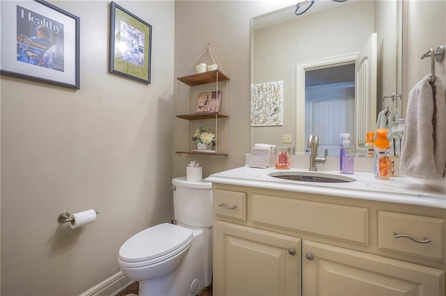 309 E 126th St, Kansas City, MO 64145 - bathroom featuring toilet and vanity