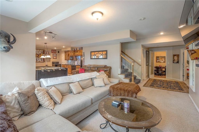 309 E 126th St, Kansas City, MO 64145 - living area with stairway, light carpet, and recessed lighting