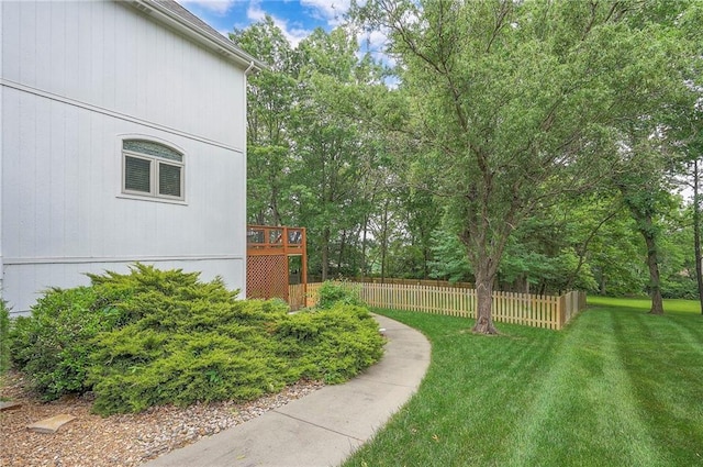 309 E 126th St, Kansas City, MO 64145 - view of yard with a deck