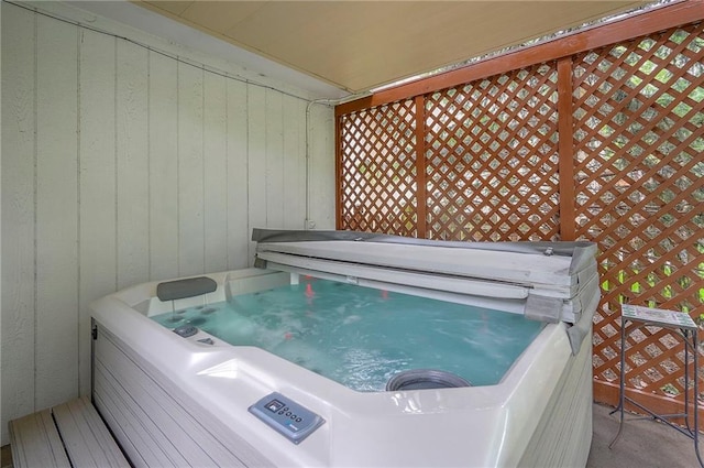 309 E 126th St, Kansas City, MO 64145 - wooden deck with a hot tub