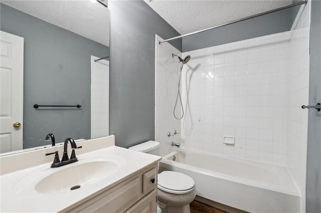 13701 W 149th St, Olathe, KS 66062 - bathroom featuring a textured ceiling, bathing tub / shower combination, and vanity