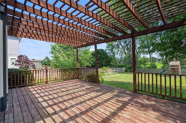 13701 W 149th St, Olathe, KS 66062 - wooden terrace featuring a fenced backyard, a playground, and a pergola