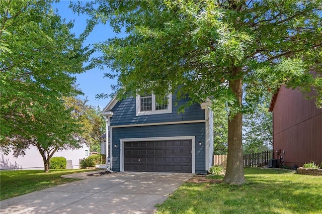 13701 W 149th St, Olathe, KS 66062 - view of front of property featuring a garage and driveway
