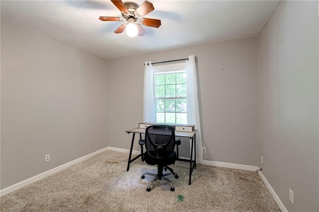 4430 E 107th Ter, Kansas City, MO 64137 - carpeted home office featuring baseboards and ceiling fan