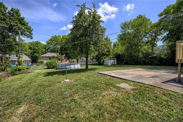 4430 E 107th Ter, Kansas City, MO 64137 - view of yard with a storage shed, an outdoor pool, and a patio area