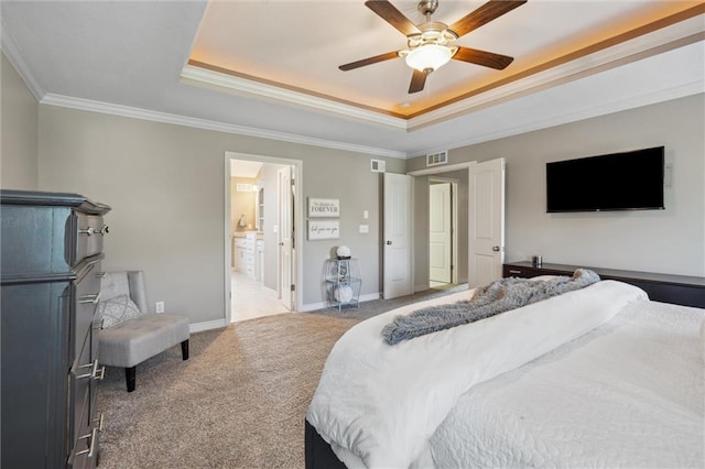 1220 Kingsland Cir, Raymore, MO 64083 - bedroom with a raised ceiling, ornamental molding, carpet floors, ceiling fan, and connected bathroom