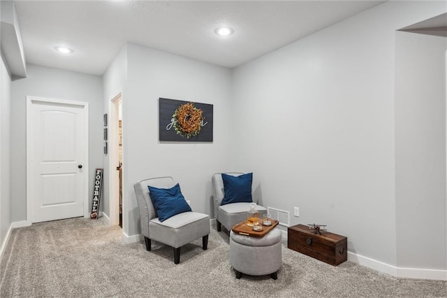 1220 Kingsland Cir, Raymore, MO 64083 - sitting room featuring carpet flooring and recessed lighting