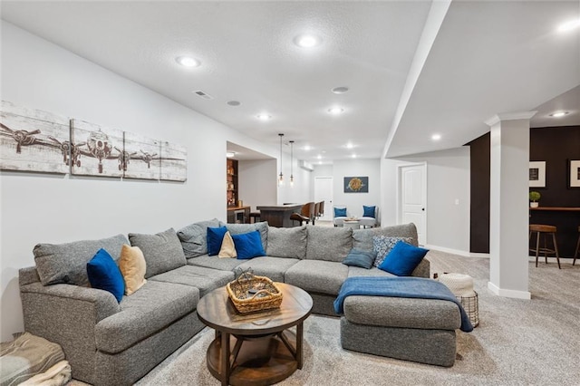 1220 Kingsland Cir, Raymore, MO 64083 - living room with carpet flooring and recessed lighting