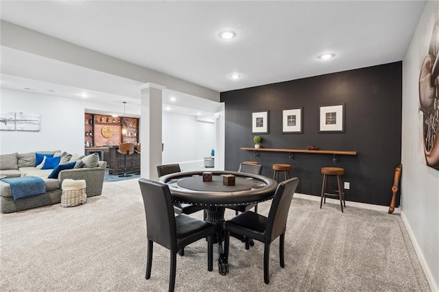 1220 Kingsland Cir, Raymore, MO 64083 - dining area with a dry bar, carpet, and recessed lighting