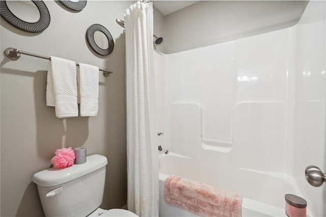 1220 Kingsland Cir, Raymore, MO 64083 - full bath featuring shower / bathtub combination with curtain and toilet