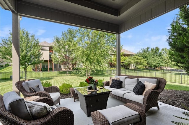 1220 Kingsland Cir, Raymore, MO 64083 - fenced backyard with outdoor lounge area and a patio area