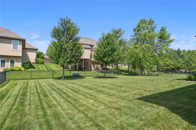 1220 Kingsland Cir, Raymore, MO 64083 - view of fenced backyard