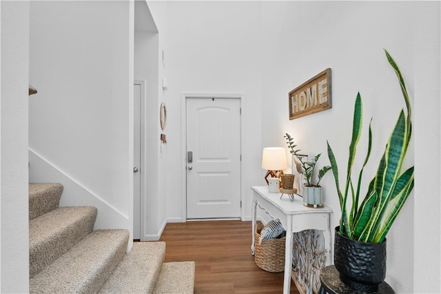 27104 E Cedar Grove Dr, Lees Summit, MO 64086 - foyer with wood finished floors and stairs