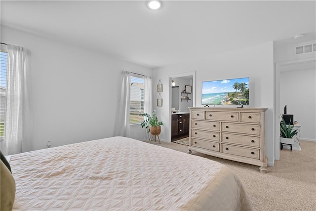 27104 E Cedar Grove Dr, Lees Summit, MO 64086 - bedroom with light colored carpet, ensuite bathroom, and baseboards