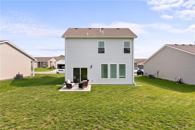 27104 E Cedar Grove Dr, Lees Summit, MO 64086 - back of property featuring a patio area and a lawn