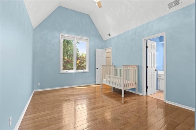 14605 Dearborn St, Overland Park, KS 66223 - unfurnished bedroom with hardwood / wood-style floors, lofted ceiling, and ceiling fan