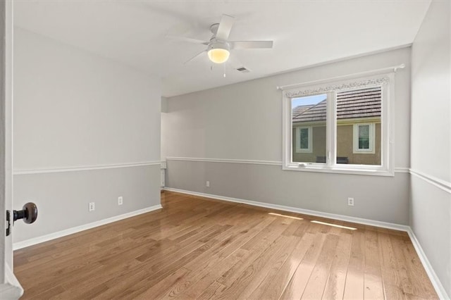 14605 Dearborn St, Overland Park, KS 66223 - spare room with wood finished floors and ceiling fan
