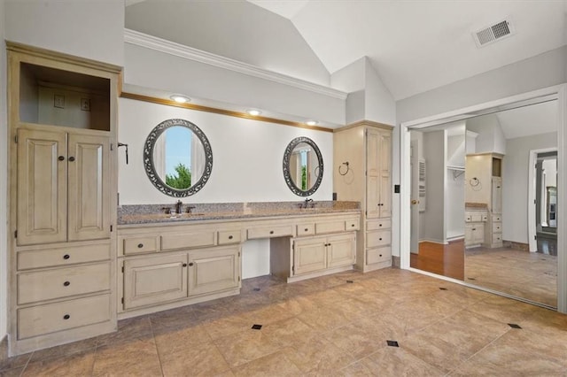 14605 Dearborn St, Overland Park, KS 66223 - full bath featuring lofted ceiling, double vanity, ornamental molding, and tile patterned flooring