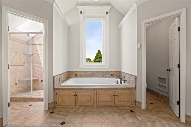 14605 Dearborn St, Overland Park, KS 66223 - full bath featuring a bath, a stall shower, lofted ceiling, and tile patterned floors