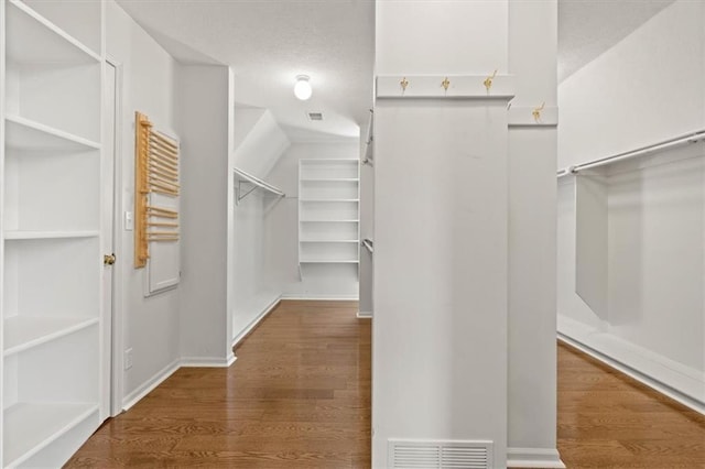 14605 Dearborn St, Overland Park, KS 66223 - walk in closet with wood finished floors and radiator