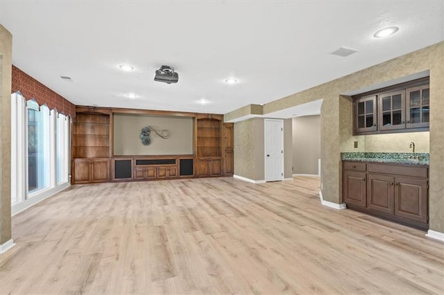 14605 Dearborn St, Overland Park, KS 66223 - unfurnished living room with light wood-style flooring and recessed lighting
