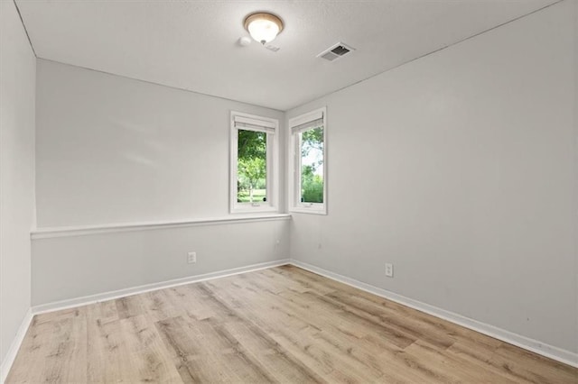 14605 Dearborn St, Overland Park, KS 66223 - unfurnished room featuring wood finished floors and baseboards