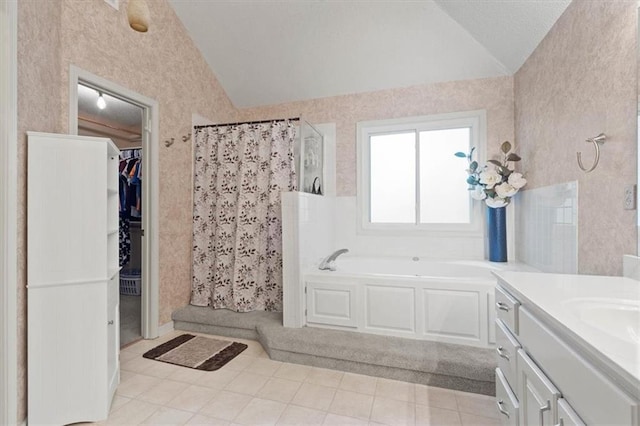 14105 W 115th St, Olathe, KS 66062 - bathroom with vaulted ceiling, a stall shower, tile patterned flooring, a garden tub, and wallpapered walls