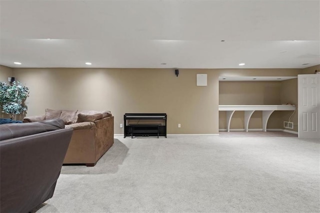 14105 W 115th St, Olathe, KS 66062 - living room featuring carpet floors, recessed lighting, and baseboards