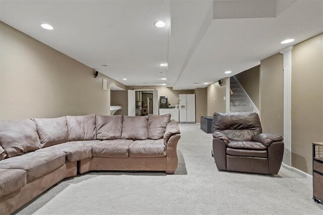 14105 W 115th St, Olathe, KS 66062 - living room featuring light carpet, stairs, recessed lighting, and baseboards