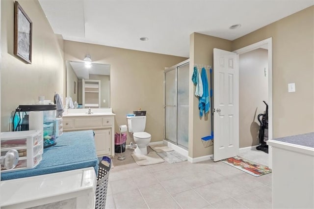 14105 W 115th St, Olathe, KS 66062 - bathroom with vanity, a stall shower, toilet, and tile patterned flooring