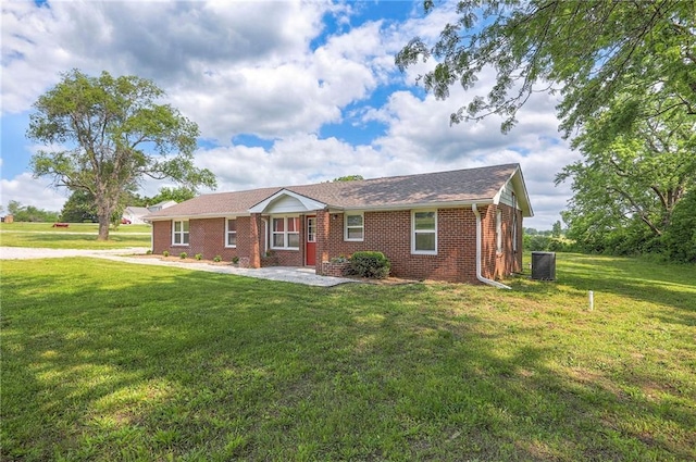 1129 US Highway 50, Centerview, MO 64019 - single story home featuring brick siding and a front yard