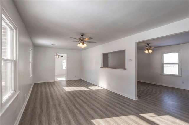 1129 US Highway 50, Centerview, MO 64019 - spare room featuring wood finished floors and ceiling fan